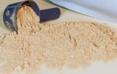 Scoop of protein powder supplement