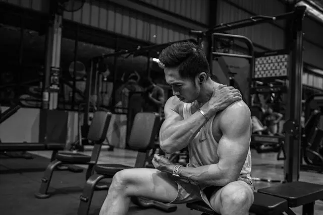 Athlete resting after a workout to support muscle recovery and reduce soreness with tart cherry juice.