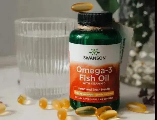 Fish oil omega-3 supplement capsules displayed with purple flowers and green leaves, representing natural anti-inflammatory support for managing insulin resistance and type 2 diabetes prevention through reduced inflammation.