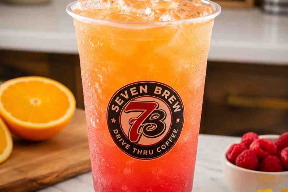7 Brew Sunrise recipe made with peach, passion fruit, and red raspberry flavors served over ice in a clear cup